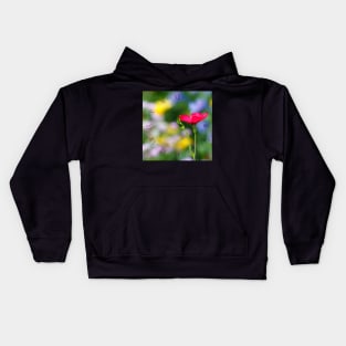 Red flower against colorful floral meadow Kids Hoodie